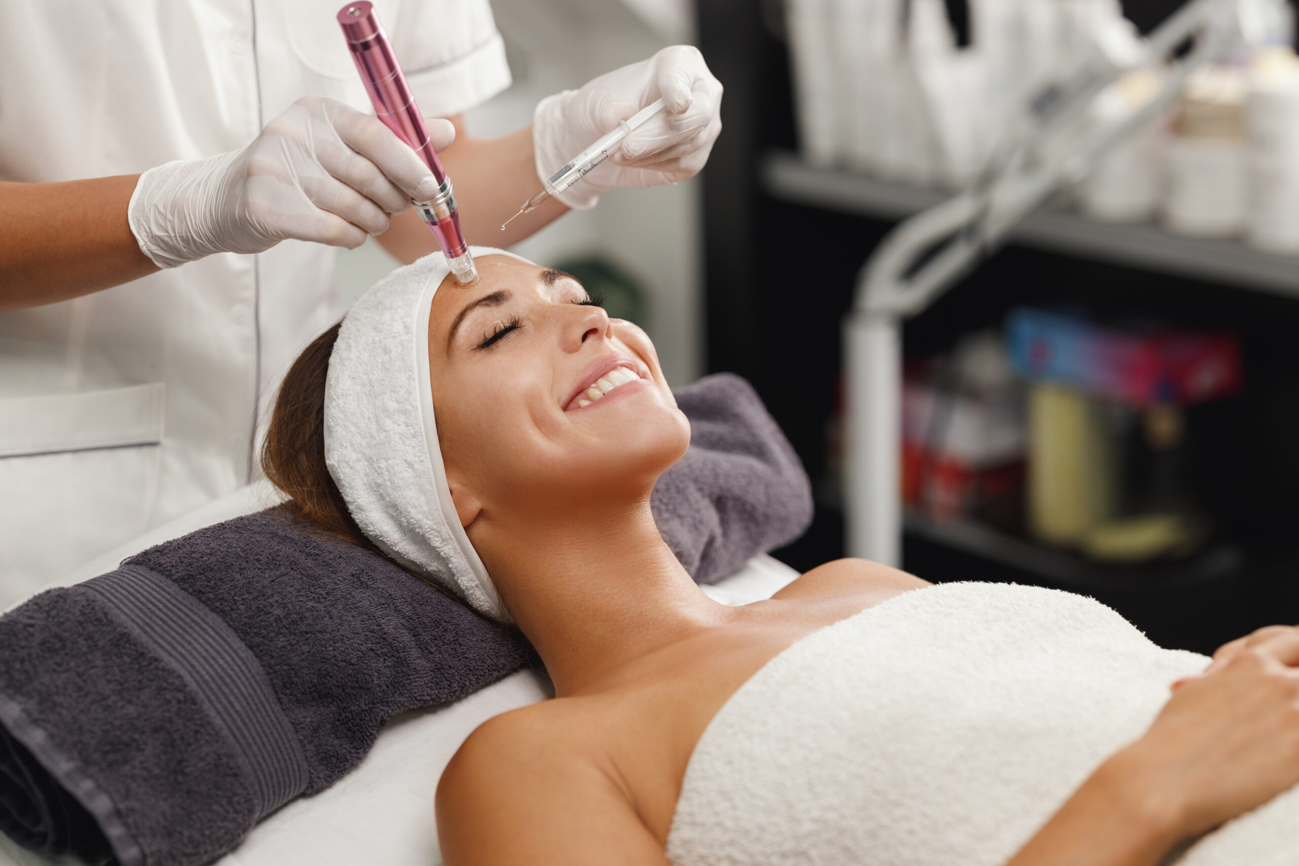 Professional performing microneedling treatment at Arcanum Aesthetics Tampa, FL to improve skin texture and radiance