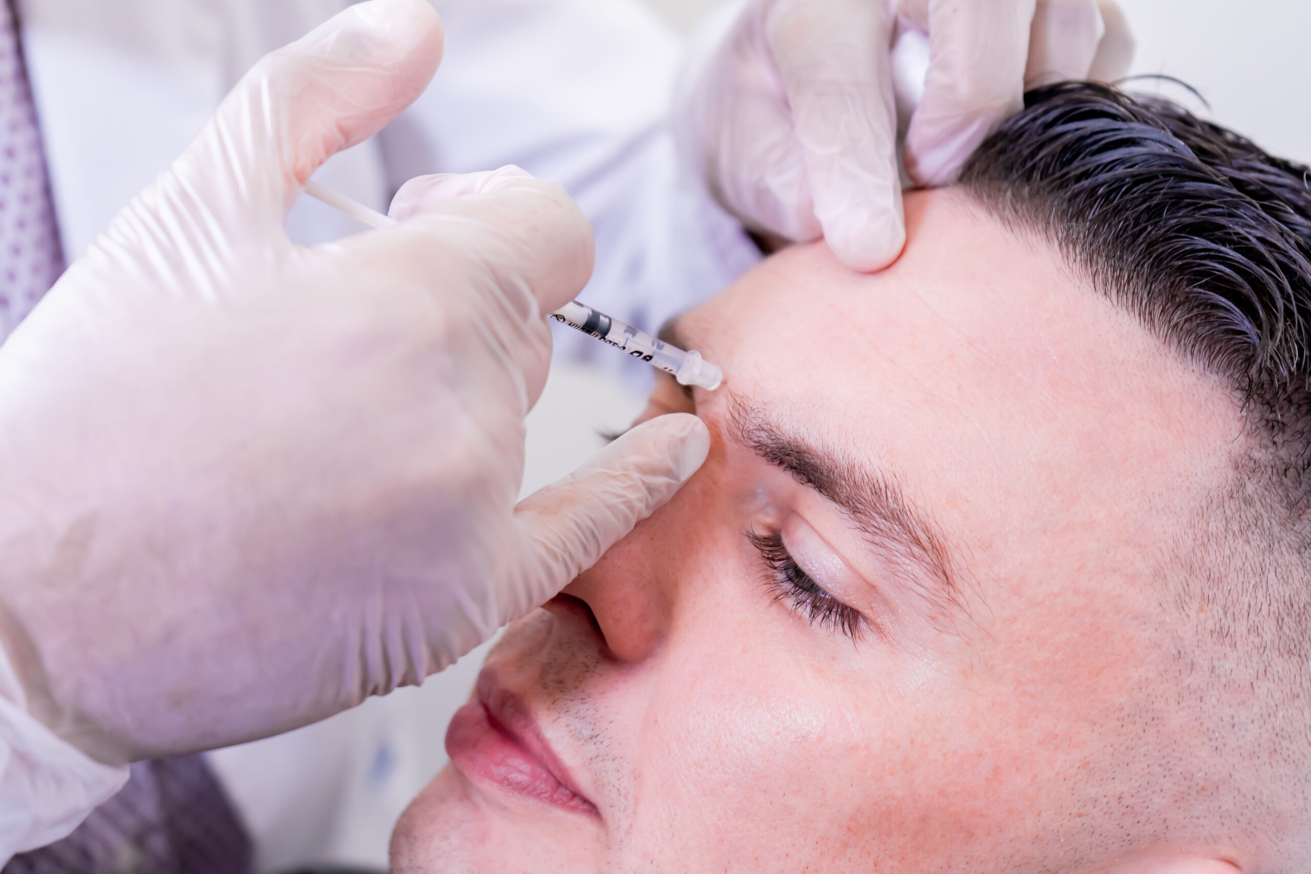 Skilled provider administering neurotoxin injections in Tampa, FL for wrinkle reduction and facial rejuvenation